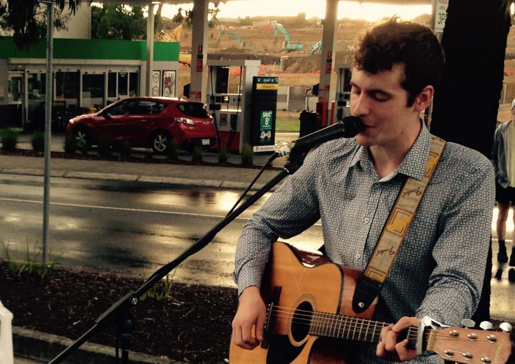 aaron-busking-in-the-rain